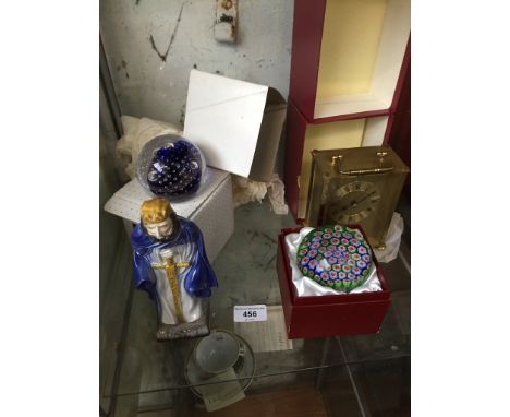 A brass carriage clock, 2 paperweights (1 Caithness), and a figure of King Lear  