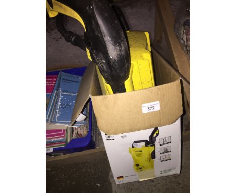 A Karcher K2 Compact pressure washer  