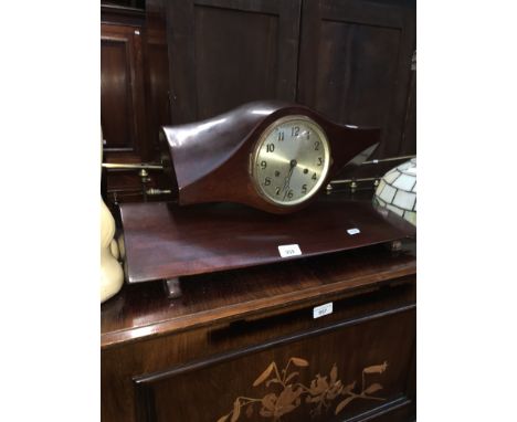 A WWI mantle clock housed in a propeller, height 28cm, width 56cm and depth 24cm.  