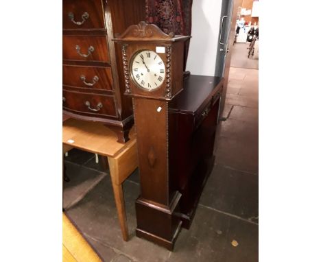 A 1920s oak cased grandaughter clock, height 135cm.  