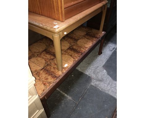 A retro teak coffee table and a retro teak and tile top coffee table.  