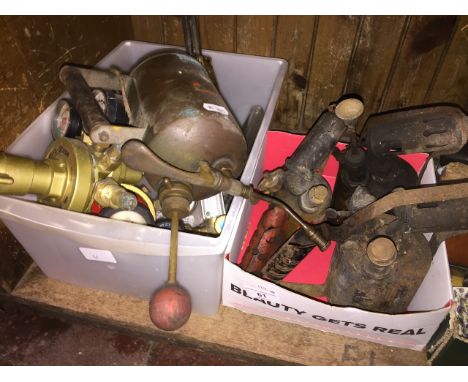 A collection of tools including blowlamps, oxy acetylene gas axe tools and an oil sprayer.  
