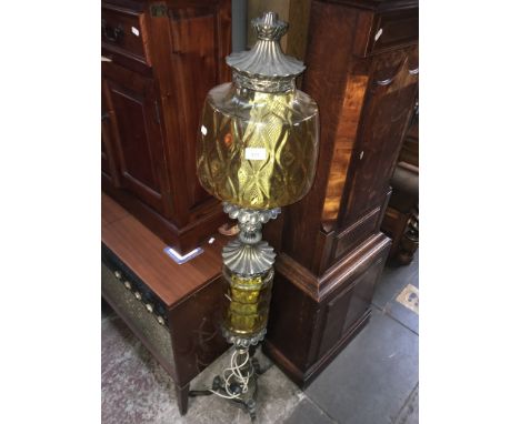 An electrified brass and glass floor standing oil lamp, height 140cm.After inspection, the Lot 812 is in good condition with 