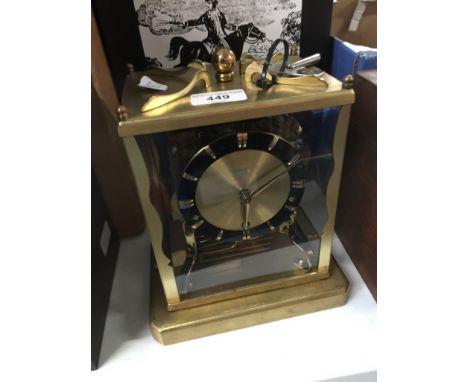 A Schatz striking clock with key, height 23cm.  Condition - clock not tested, general wear throughout.