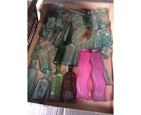 Box of vintage glass bottles  