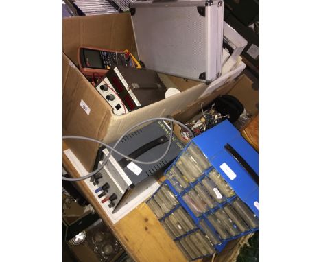 A box containing various tools and electrical components to include a micrometer set, a Moore &amp; Wright 1-2" micrometer, v
