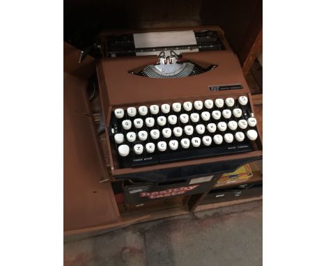 A vintage SCM Smith-Corona typewriter, designed by Ghia.