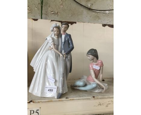 A Lladro ballerina and a Nao wedded couple model.  