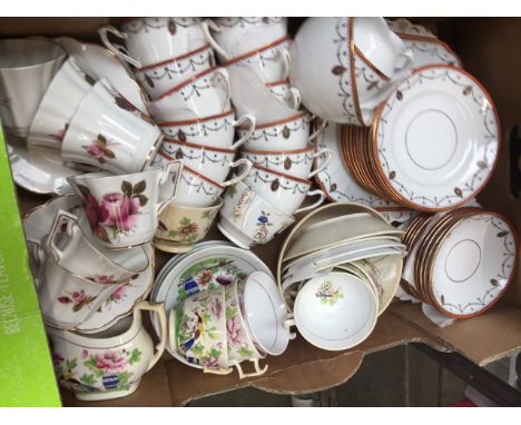 Box of ceramic cups and saucers  Some wear
