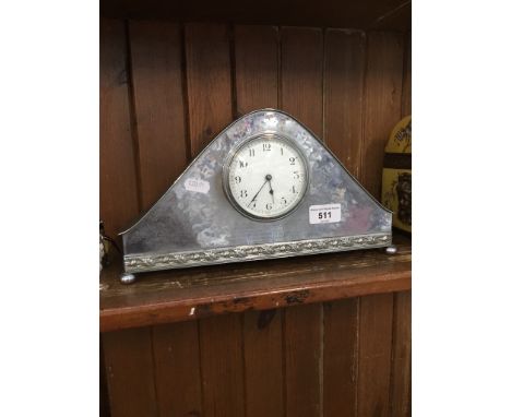 An early 20th century pewter mantle clock, presented to SSMP J Collins by officers, NCOs &amp; men of DS Squardon, the Duke o