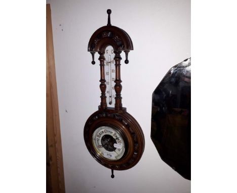 An Edwardian aneroid barometer.  