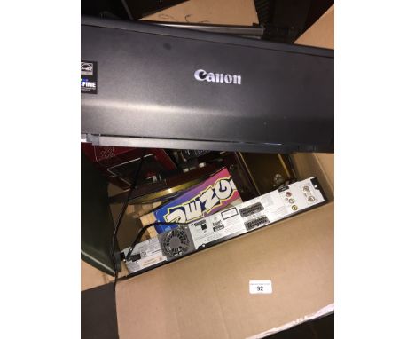 A box of electricals and games to include printer, clocks, camera tripod, Panasonic DVD recorder with remote, etc.  