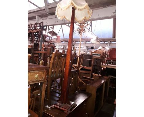 An early 20th century mahogany standard lamp, height 192cm.  