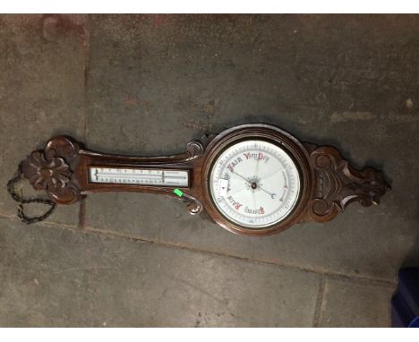 An oak cased barometer - AF  Glass is broken.