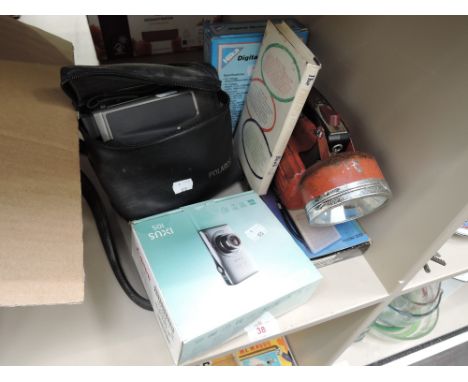 A selection of electronics including vintage torch, cameras, Polaroid etc