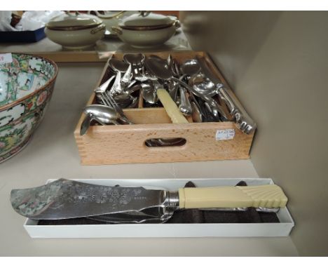 A selection of silver plated flatware including carving set, cake slice, fish servers etc