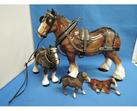 A Beswick study, Shetland Foal 1034, Two ceramic shire horses and a similar foal