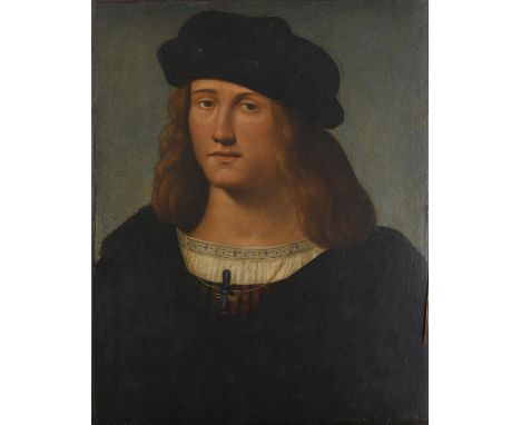 MANNER OF ANDREA SOLARIO (1460-1524) PORTRAIT OF A YOUNG MAN Bust length, wearing a dark cloak and cap, gold neck chain, oil 