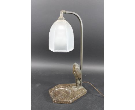 ART DECO LAMP - STORK a spelter figure of a stork, mounted on a marble base with circular recess, with a frosted glass shade 