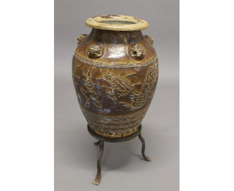 CHINESE 'MARTABAN' STORAGE JAR a large brown glazed stoneware storage jar, with incised decoration of Dragon's and bands of w