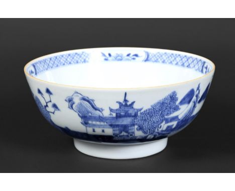 CHINESE PORCELAIN BLUE &amp; WHITE BOWL 18thc, a large blue and white bowl, painted with buildings by water within mountainou