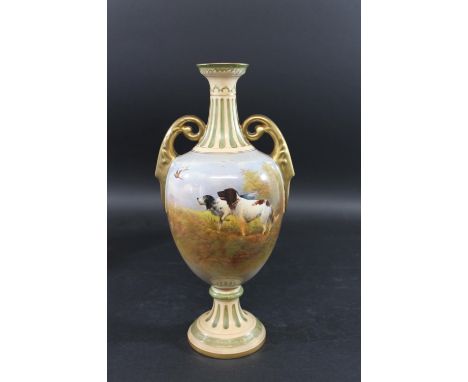 LARGE CROWN DEVON SIGNED VASE - R HINTON a large slender pedestal vase, painted with Spaniel's in a landscape scene with a ph