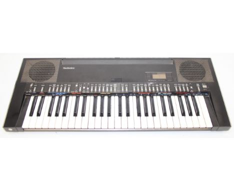 A vintage Technics SX-K200 keyboard in transportation carry case 