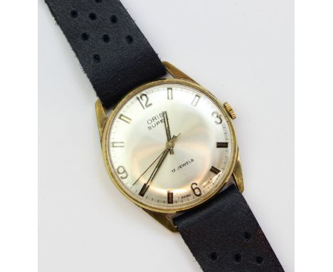 A vintage Oris Super wristwatch, 17 jewels hand wind mechanical movement, shock resistant with gold plated bezel, later leath
