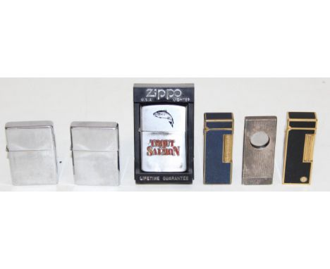Mix of vintage lighters to incl Zippo and a cigar cutter, two examples by Dunhill etc