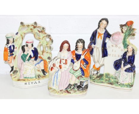 Three Staffordshire Figures - A 19th century Staffordshire figure titled Rival, a figure of a couple with dog and lute, and a