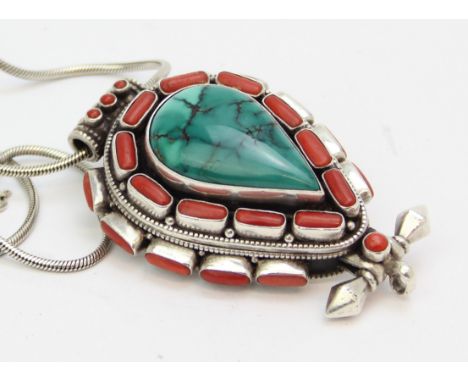 A large silver, turquoise and coral pendant necklace, believed to be a Tibetan Ghau amulet, unmarked but XRF confirmed as sil