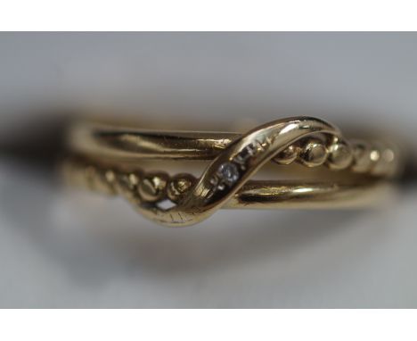 9ct Gold solitaire knotted ring 