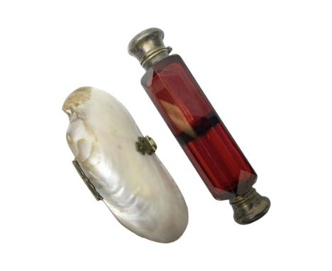 Victorian ruby glass double end scent bottle with silver covered to either end, together with with shell coin purseCondition 