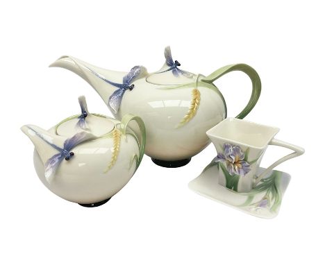 Franz Teapot decorated with dragonflies, together with a matching sucrier and cover and a cup and saucer in Iris pattern, all