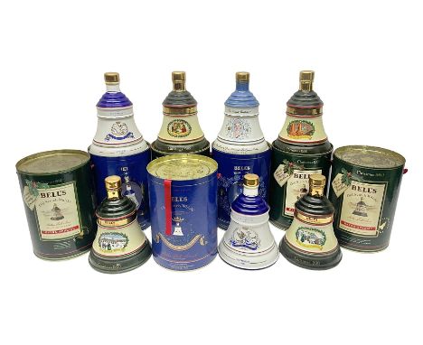 Bells, Scotch whisky, in seven Wade ceramic decanters, including Christmas 1988, 1989, 1990, 1991 etc