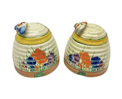 Two Clarice Cliff Bizarre for Newport Pottery, beehive honey pot with cover in Crocus pattern, with printed mark beneath, H9c