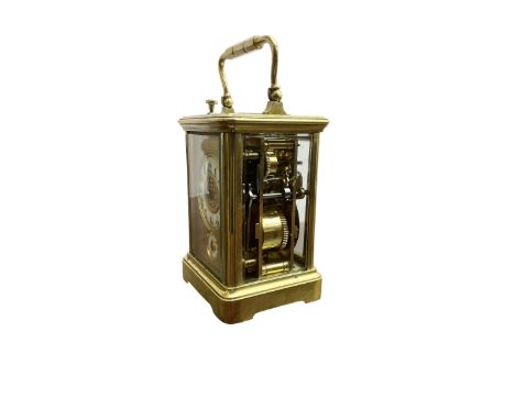 French - small 8-day striking carriage clock with alarm and repeat functions, c1910, in a corniche case with a gilt dial mask