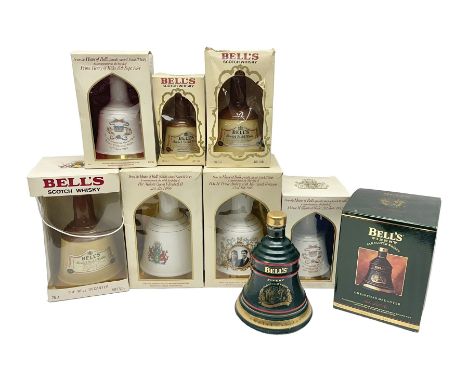Bells, Scotch whisky, in eight Wade ceramic decanters, including Christmas 1992, Queens 60th birthday, Birth of Prince Willia