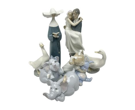 Two Lladro figures, Over the Threshold no 5282 and Prayful Moment no 5500 together with five Nao figures