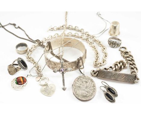 ASSORTED SILVER JEWELLERY comprising silver engraved hinged bangle, silver I. D. bracelet, silver locket on chain, white meta