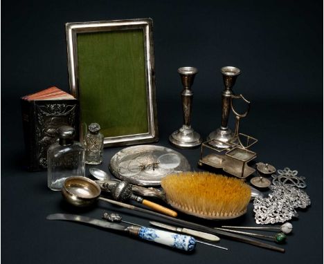 ASSORTED SILVER COLLECTIBLES, including pair small candlesticks, prayer book, toddle ladle, belt buckle, mother of pearl penk