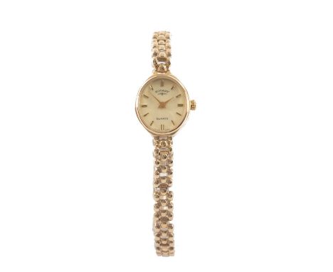 9CT GOLD LADY'S ROTARY WRISTWATCH, quartz, with oval dial, baton markers, and 9ct gold integrated bracelet, 10.0gmsProvenance