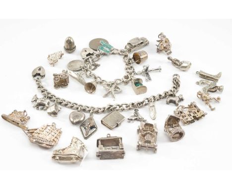TWO SMALL SILVER CHARM BRACELETS, filled with 10 and 8 charms respectively, and 15 loose charms, tot appr wt. 4.5ozt (2)
