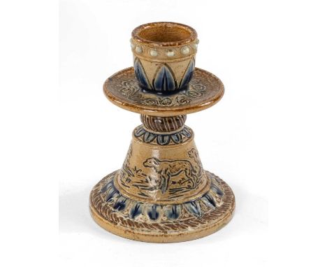 RARE DOULTON LAMBETH HANNAH BARLOW CANDLESTICK, with circular drip tray above band of dogs within blue and brown borders by H