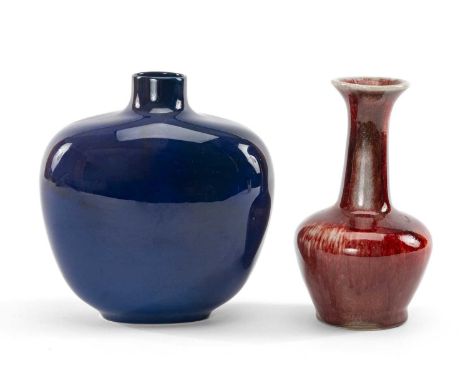 TWO 20TH CENTURY CERAMIC VASES, comprising Royal Doulton Titanian ware vase, circa 1920, Cobridge stoneware vase with Sang de