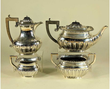 GEORGE V SILVER FOUR-PIECE TEA SERVICE, George Bowen & Sons, Birmingham 1911, half fluted oval bodies, with leaf capped squar