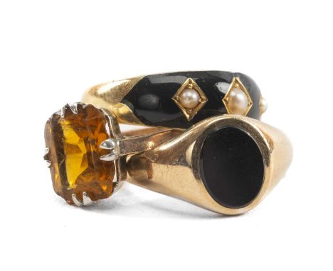 THREE GOLD RINGS comprising 15ct gold and enamel seed pearl ring, 9ct gold onyx ring and a 9ct gold and silver citrine ring, 