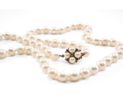 SINGLE STRAND CULTURED PEARL NECKLACE, with ruby chip set 9ct gold clasp, pearls 6/7mm diam, length 46cms, appr gross wt 29g,