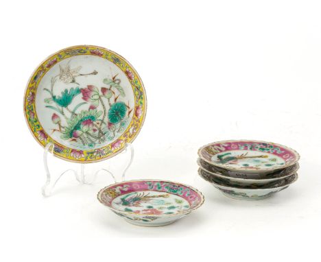A GROUP OF FIVE WHITE GROUND FAMILLE ROSE SMALL PLATES
Comprising four phoenix and peony decorated plates with pink ground bo