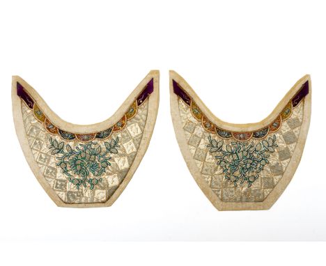 A PAIR OF GOLD TONED EMBROIDERED SLIPPER PANELS
The collar with alternating panels of insects above green and gold toned embr